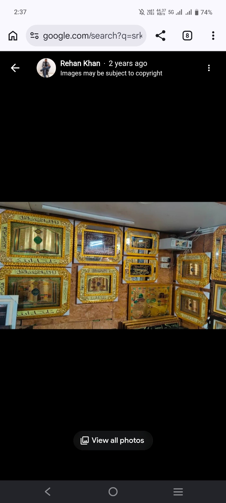 Decorative and religious wall frames displayed at SRK Enterprises