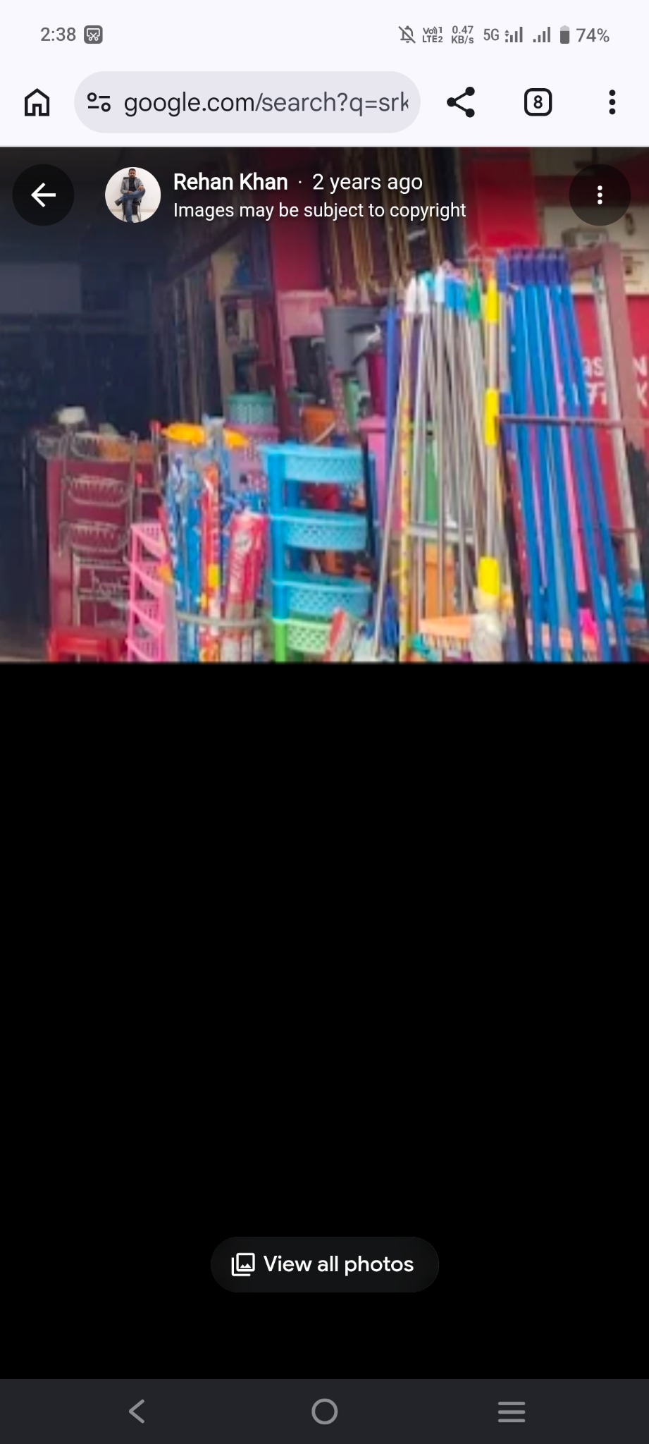 Mops, brooms, squeegees and plastic organisers outside SRK Enterprises